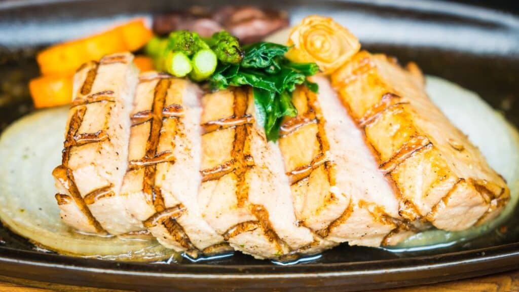 tuna meat steak in hot pan with vegetable