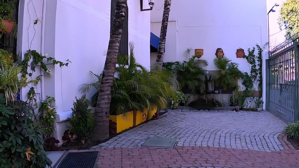 la perla guadalajara front entryway decorated with plants