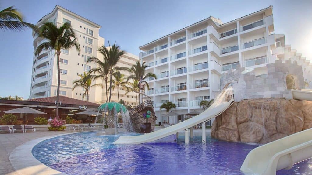 marival emotions resort behind immaculate swimming pool