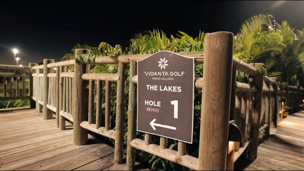 vindanta golf first hole sign on rustic deck