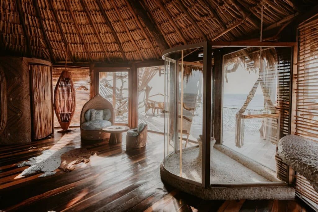 luxury moon villa living area with beach just past patio