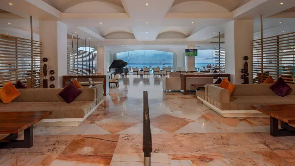 elegant main lobby with marble floors and finished wood tables