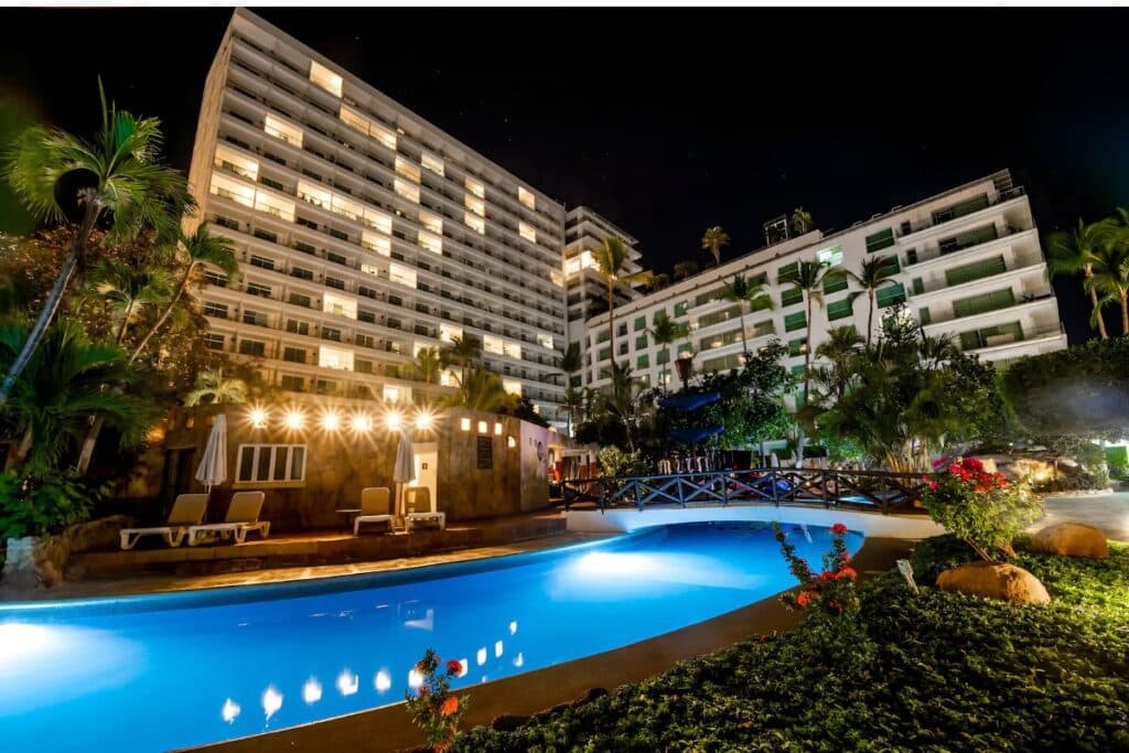hotel emporio acapulco well lit night view at outdoor pool