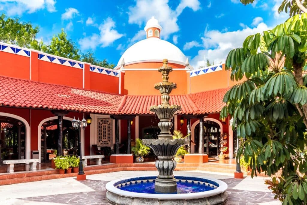 picturesque and colorful view of courtyard occidental cozumel