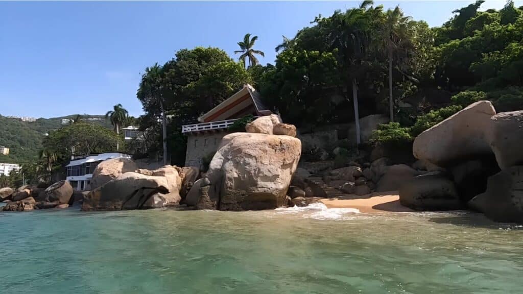 luxury beach house near the rocks at playa pichilingue