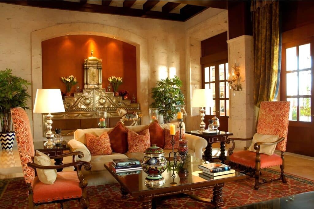 ritzy resort lounge with wood carved furniture tastefully decorated with tropical plants